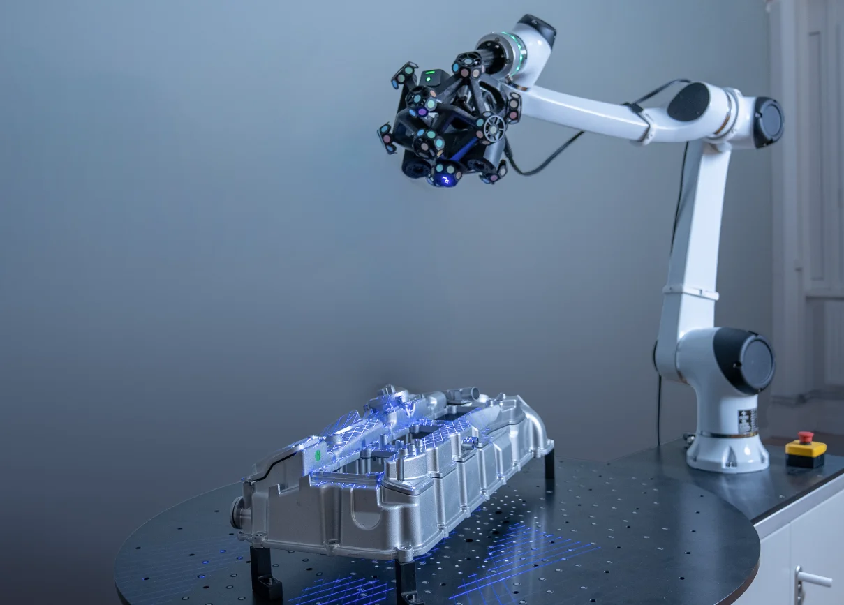 Configuración RobotScan Trak Nova escaneando una pieza sobre una mesa de mayor tamaño